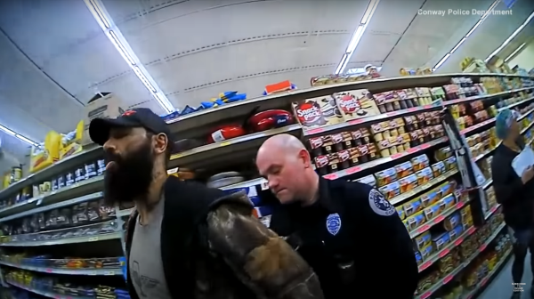 Body cam film shows officers stepping on Black Man who says "I can't breathe"