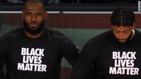 LeBron James and multiple NBA players kneel for National Anthem